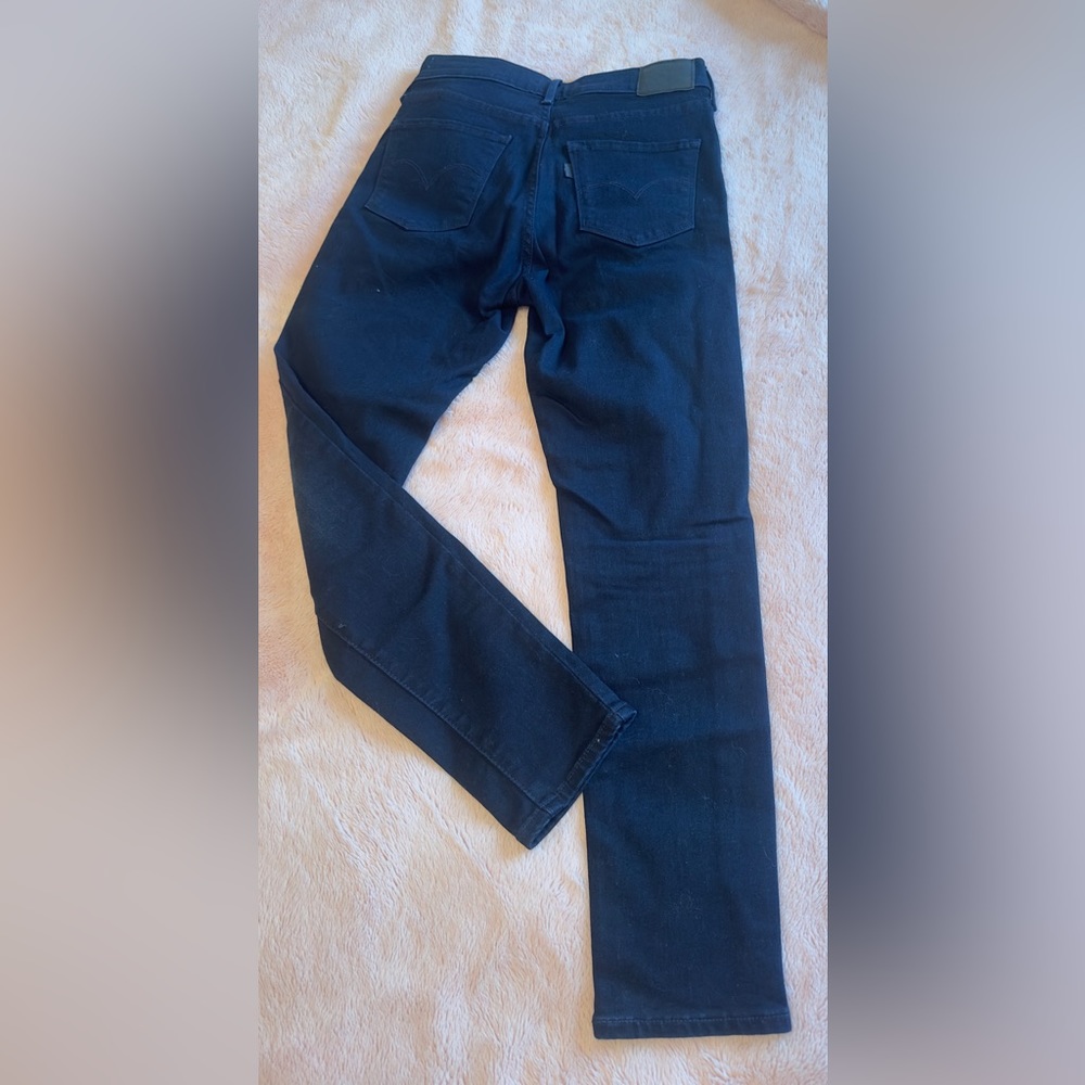 Dark blue 311 Levi’s jeans